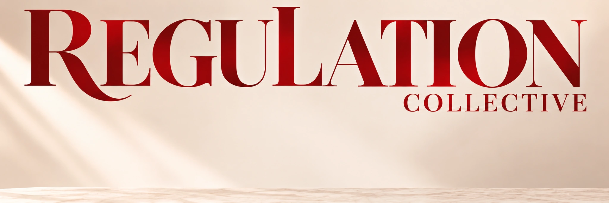 The Regulation Collective lettering on a softly lit cream studio backdrop